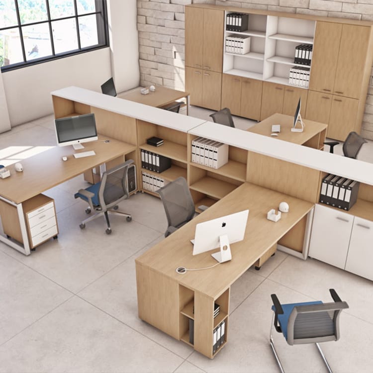 The Cubiko Operative office is elegantly furnished with wooden desks and ergonomic chairs, complemented by desktop computers, organized office supplies, and shelves filled with binders. Large windows bathe the space in abundant natural light, creating a bright and inviting atmosphere. Studio Office Cyprus