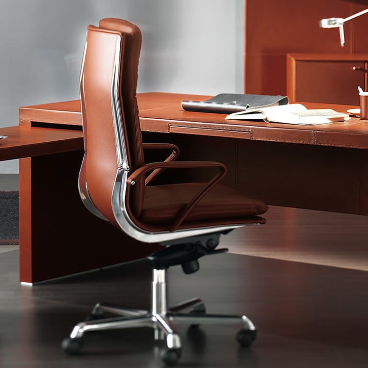 Athena Executive Desk with brown leather and chrome accents. Sophisticated workspace.