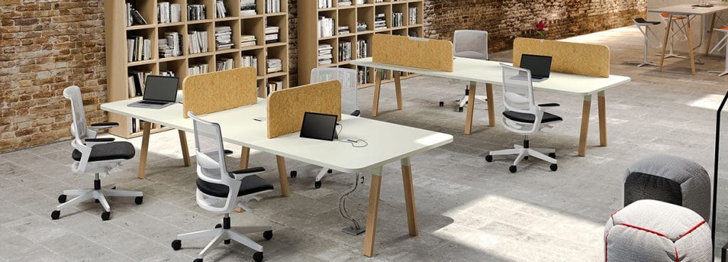 Modern Atreo Wood workstation with white desks, wood legs, and privacy screens in a collaborative office space.