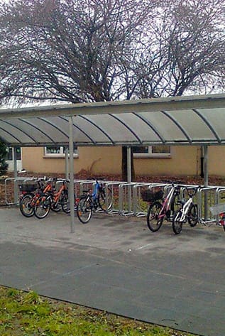 Covered bike rack. Modern Street Furniture for urban spaces.