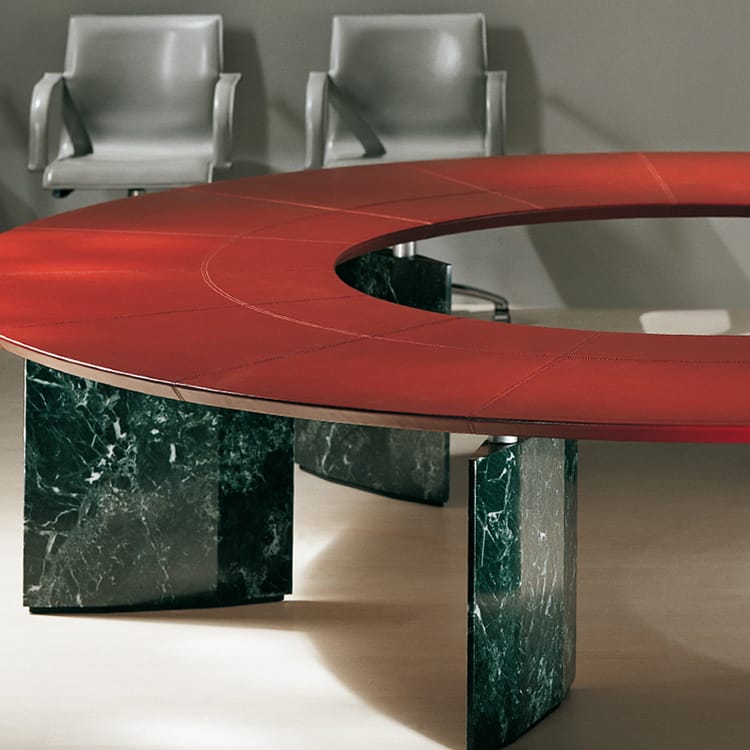 Red leather Epico Conference Table with marble base. Elegant design for collaboration spaces.
