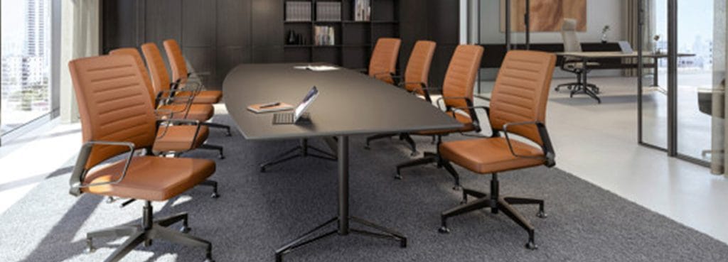Fascino-2 F125 conference table with brown leather chairs in a modern meeting room.
