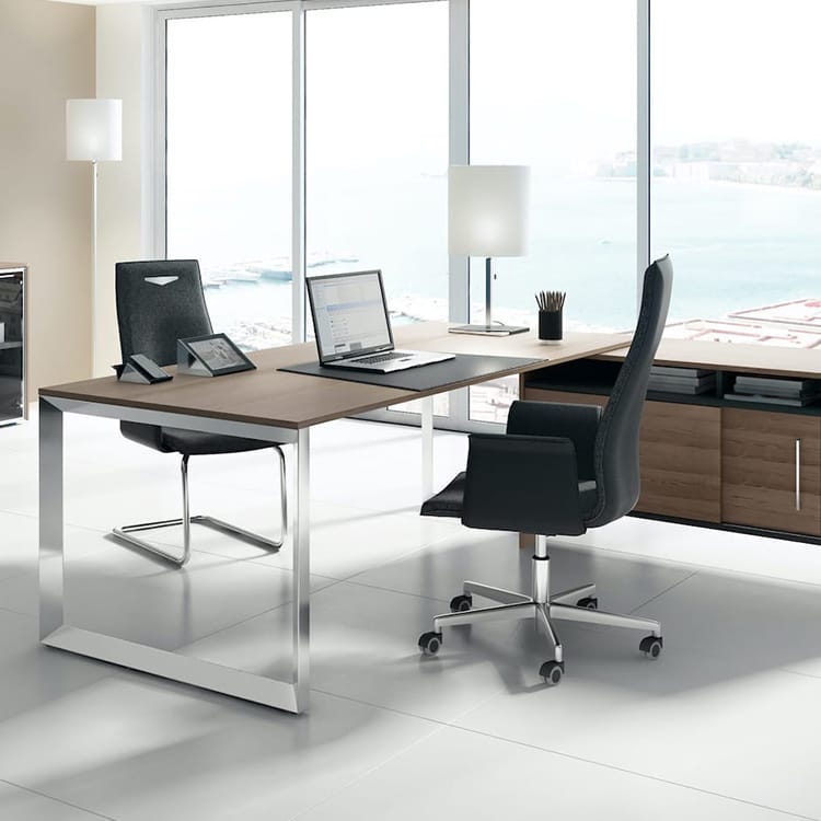 GENESIS executive desk with wood top, metal legs, and black leather chairs. Modern office furniture.