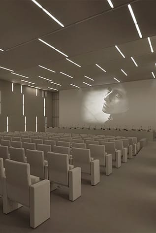 Beige Amphitheater seating with a screen and modern lighting.