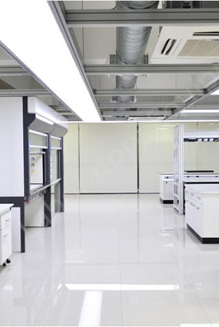Bright, modern laboratory furniture. White cabinets, sleek design.