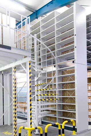 White Mobile Archive Filing Systems with spiral staircase. Maximize your storage space.
