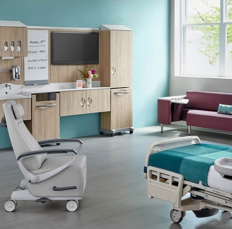 Modern healthcare furniture: patient room with storage, bed, chair, and sofa.