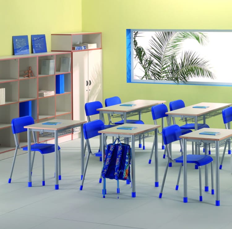 Classroom view with blue chairs and desks. School Furniture for education.