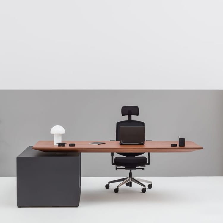Modern Gravity Executive Desk by MDD. Wood veneer top, dark gray base, and ergonomic black chair.