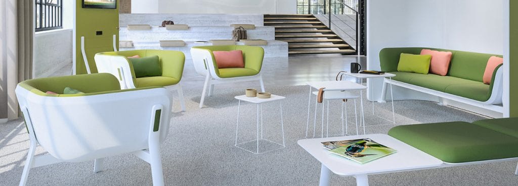 Modern office space featuring the Interstuhl HUB seating collection in green and white.