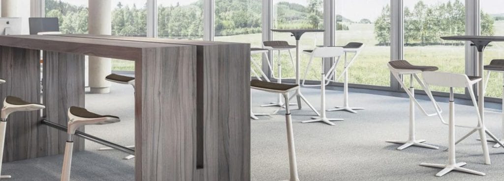 Minimalist KINETICis5 stool by Interstuhl, white frame, brown seat, in a modern office space.