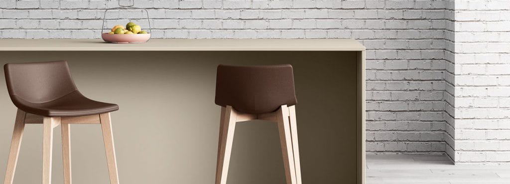 Modern Superotto Stool with brown seat and light wood legs.
