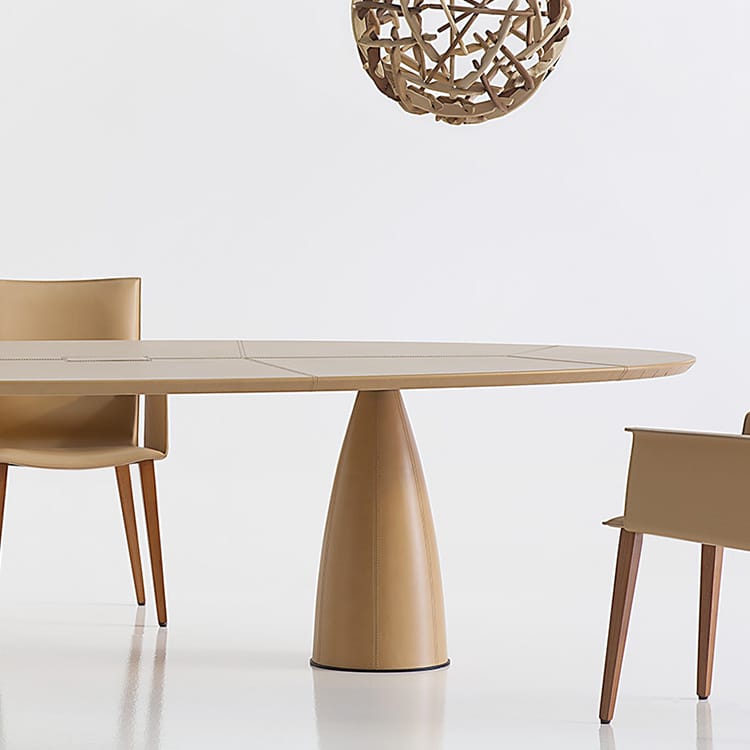 Elegant Mythos Conference Table in light brown leather with matching chairs, ideal for modern collaboration spaces.