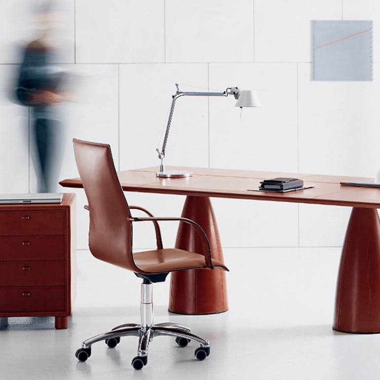 Mythos desk and chair. Brown leather executive office furniture with modern chrome lamp.