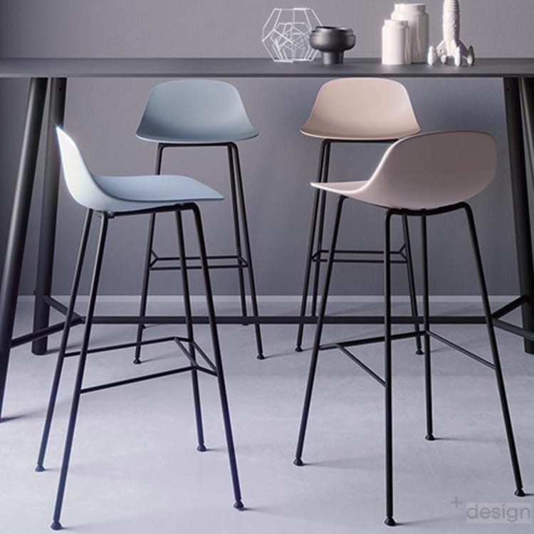 Four Pure Loop Mini Stools in blue and beige with black metal legs. Contemporary seating.