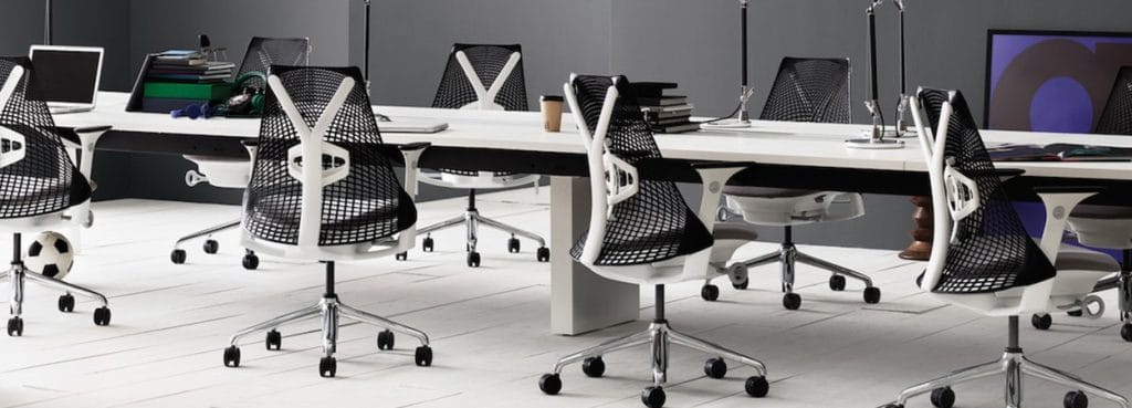 Office space featuring the modern Sayl chair in black and white.