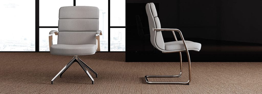 Two Scena Visitor Chairs, one with a swivel base and one with a sled base, in gray fabric with metal frames.