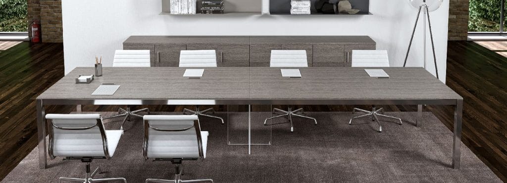 Contemporary Zefiro Conference Table with gray wood top and metal frame, surrounded by white chairs.