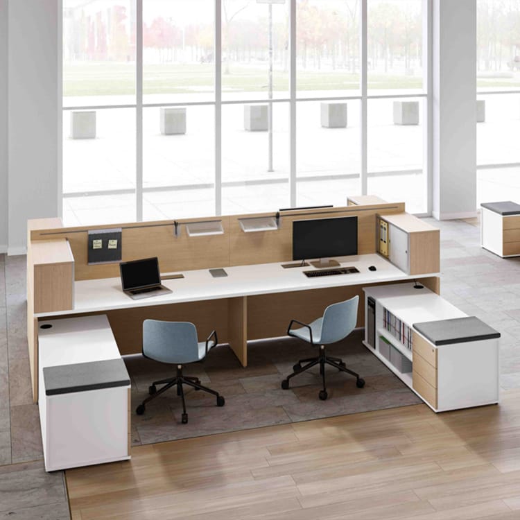 Modern Atlante workstation with light wood and white finishes, paired with blue office chairs.