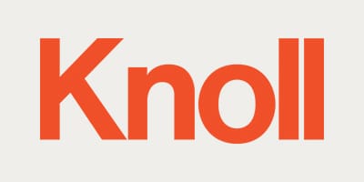 Λογότυπο Knoll. Πορτοκαλί κείμενο σε ανοιχτόχρωμο φόντο.
