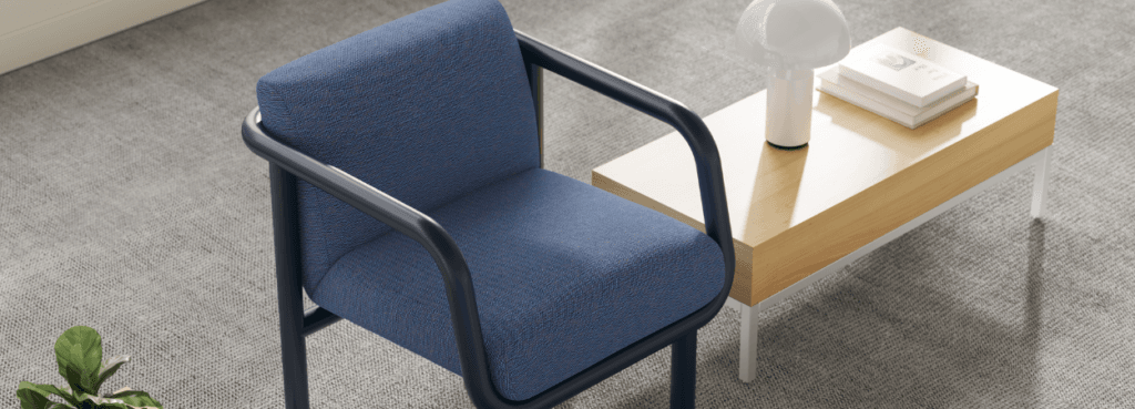 Πολυθρόνα Percy Lounge της NaughtOne με μπλε ύφασμα και μαύρο σωληνωτό σκελετό. Σύγχρονος σχεδιασμός.