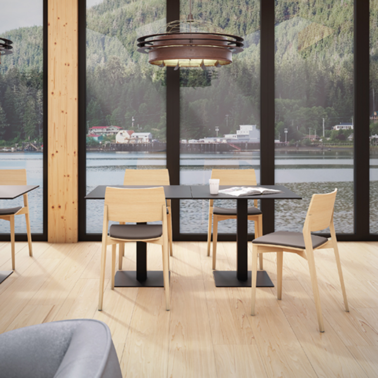 Infiniti Plano table and chairs in a café with a lake view