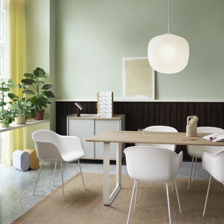 Rime pendant lamp in white above a meeting table